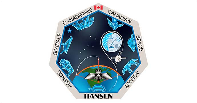 Un heptagone avec un insigne d'astronaute et divers symboles d'animaux. Le nom Hansen est écrit au bas en majuscules