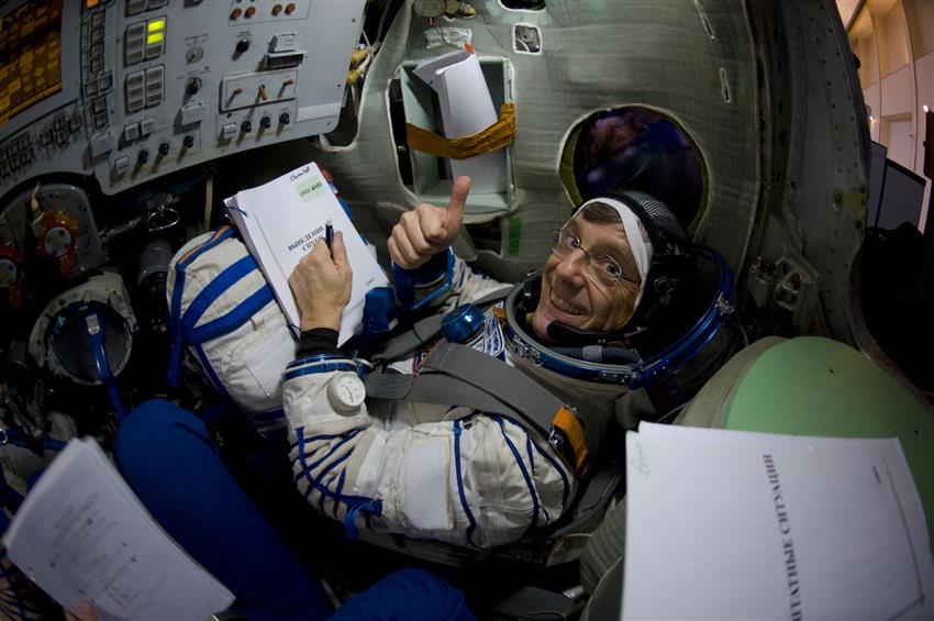 Bob Thirsk training in a Soyuz Capsule simulator