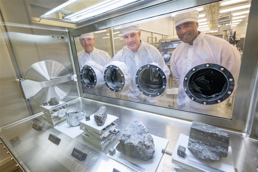 Three astronauts during geology course at NASA