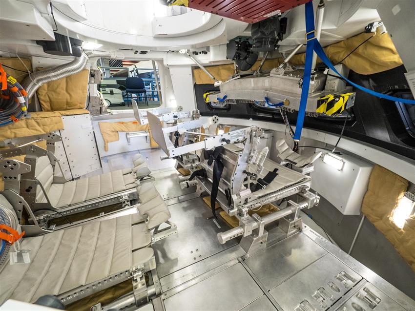 Interior view of Orion’s medium-fidelity mock-up for astronaut training.