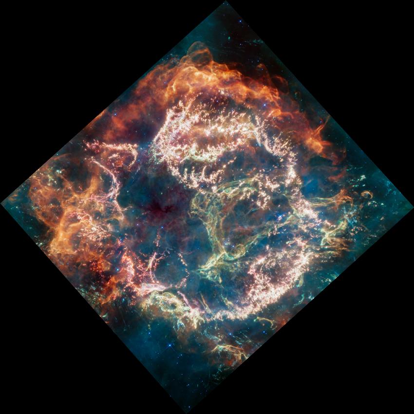 Colourful image of a supernova remnant, as seen in a diamond shape on a black background. 