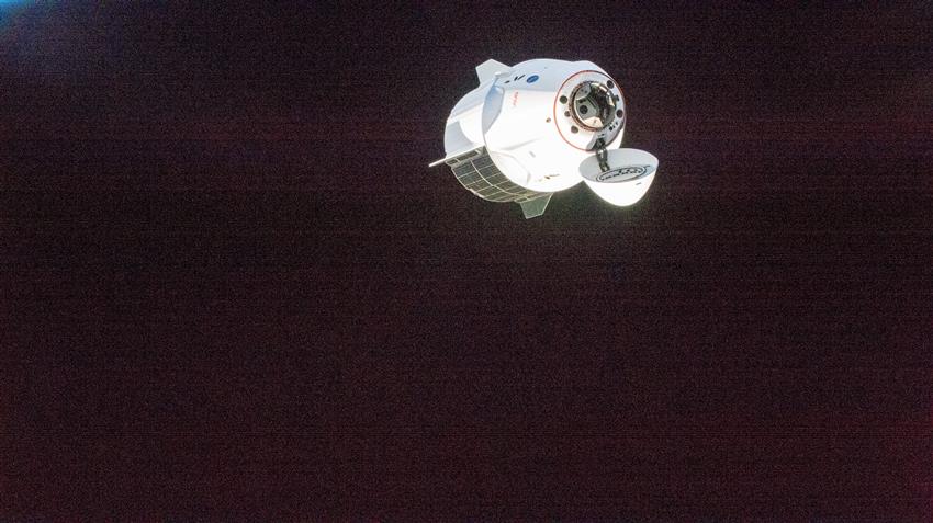 The SpaceX Dragon spacecraft approaches the International Space Station for docking.