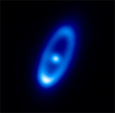 L'étoile Fomalhaut et son disque de débris interplanétaires.