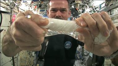 Thumbnail for video: 'Wringing out water on the ISS - for science!'